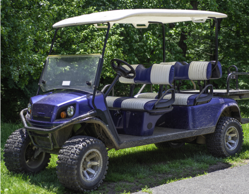 A golf cart that has a Low Speed Vehicle Insurance Policy from the Tucker Agency, the Best Insurance Agency in Nashville, TN.